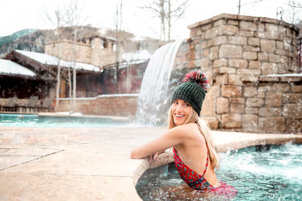 Woman in hot tub at Lodge Tower in Vail, CO